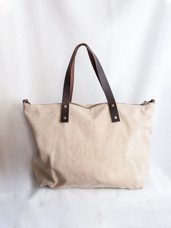 Bolso shopper de color beige