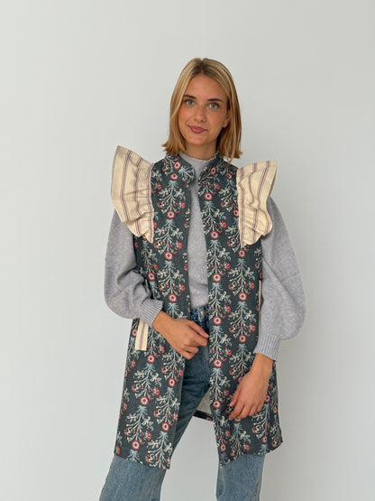 Chaleco 9MÁS5 Flores Azul y Fresa