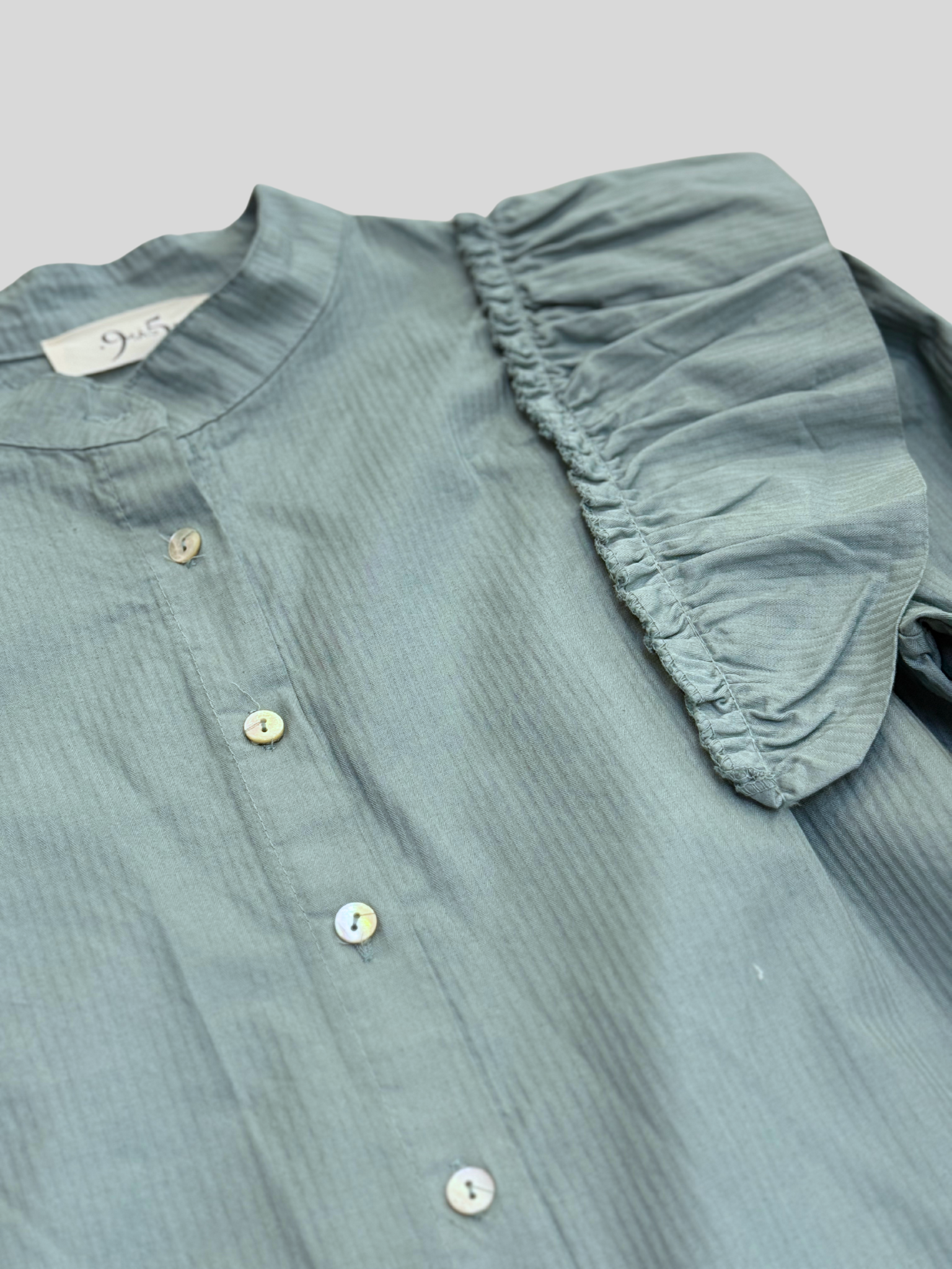 Detalle foo camisa venecia verde agua